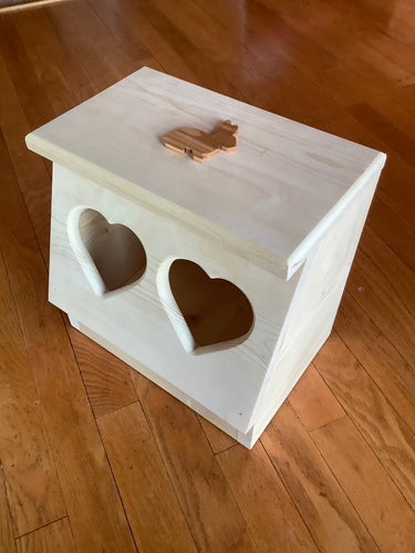 Bunny rabbit hay feeder with heart shaped hay holes